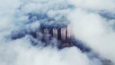 4k航拍俯瞰城市云海云雾缭绕风景视频的预览图